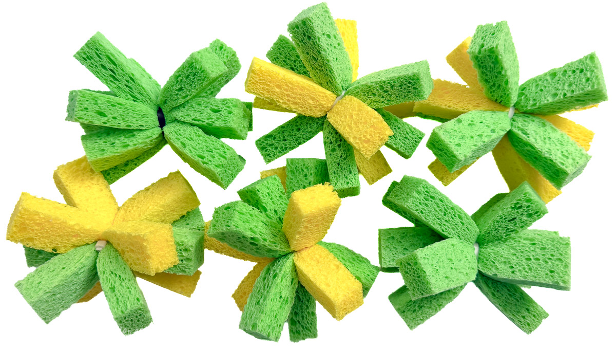 Green and yellow sponge water bombs bundled with ties, arranged in a group on a white background for outdoor summer water play.