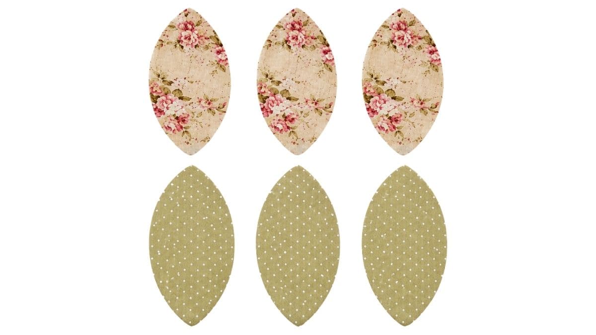 Six fabric body panels cut from floral and polka dot cotton fabric, arranged in two rows for sewing a fabric teapot project.
