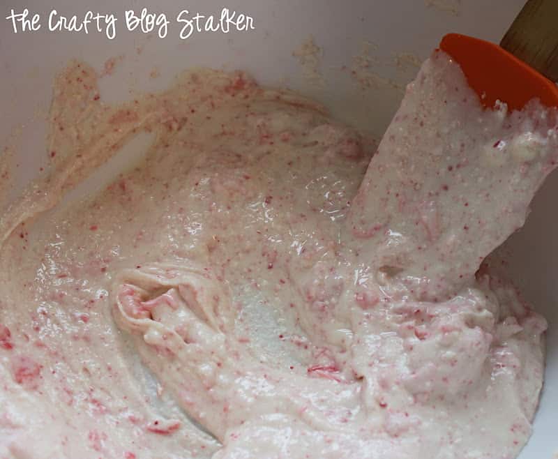 White chocolate mixed with peppermint dust in a bowl.