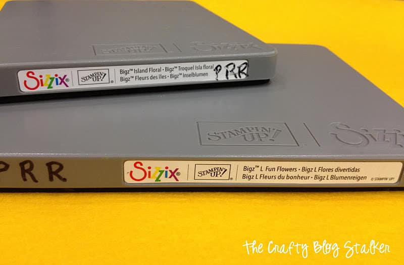 Two Sizzix Big Shot dies stacked on top of each other.