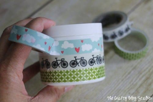 wrapping a travel jar with washi tape