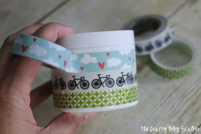 wrapping a travel jar with washi tape