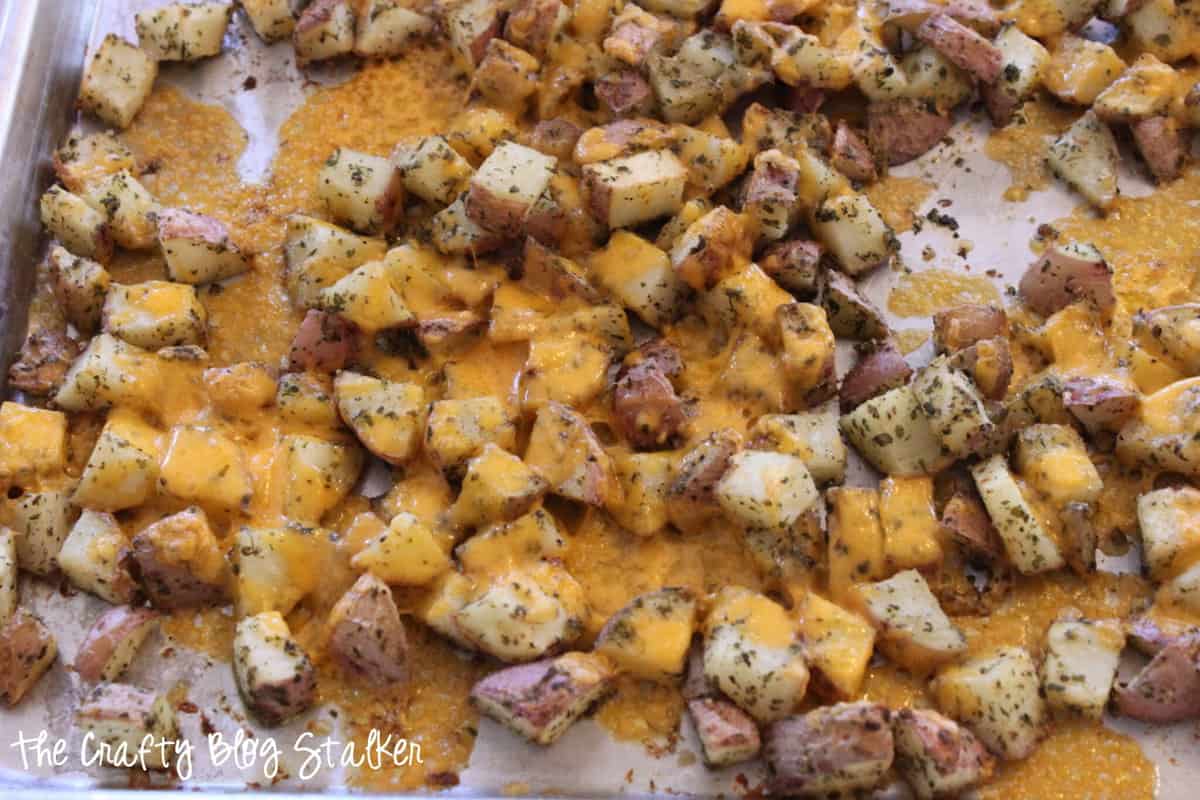 image of cheesy ranch potatoes coming out of the oven