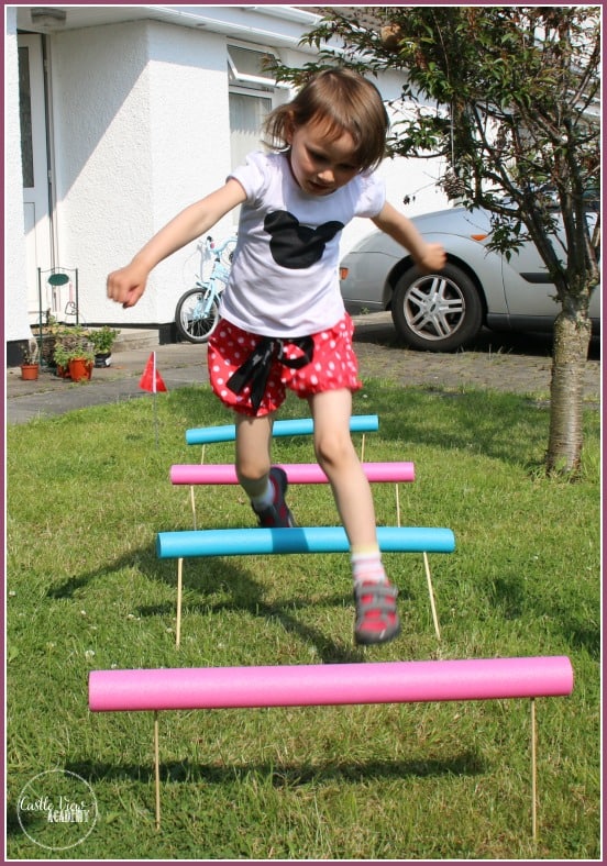 image of a girl jumping over Pool Noodle Hurdles