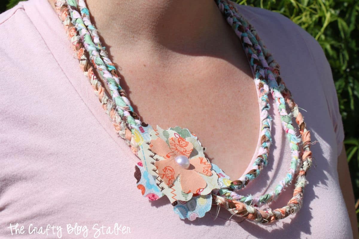 Braided fabric necklace.