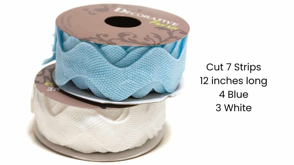 Two rolls of ric rac ribbon, one blue and one white, shown with instructions to cut 7 strips total, each 12 inches long: 4 blue and 3 white.