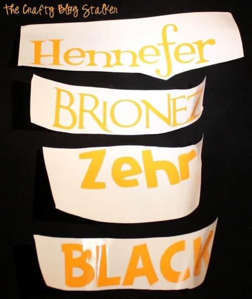 image of names cut out of orange vinyl with a cricut explore air 2
