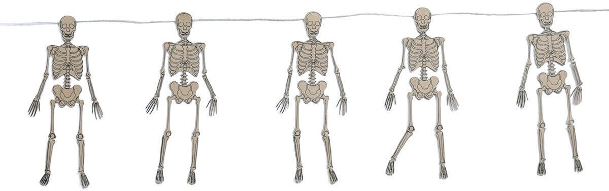 Five posable paper skeletons hanging from string to create a Halloween skeleton banner.