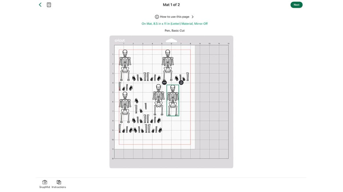 Cricut Design Space mat preview with skeleton banner pieces arranged on an 8.5 x 11 inch cutting mat.
