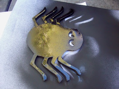 spray painted spider shape