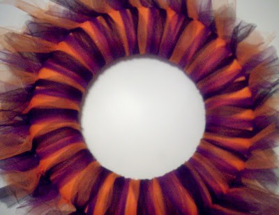 tulle tied in a knot around wreath