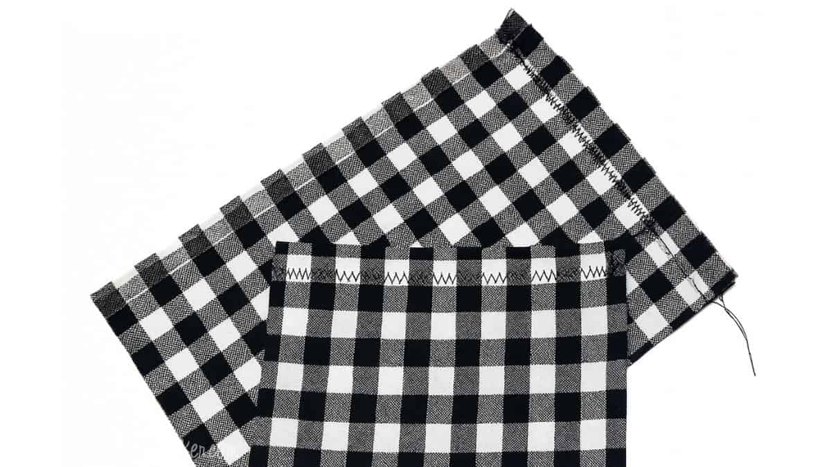 Black-and-white gingham fabric pieces are shown, with one pocket stitched to the larger piece using a zigzag seam along the top edge.