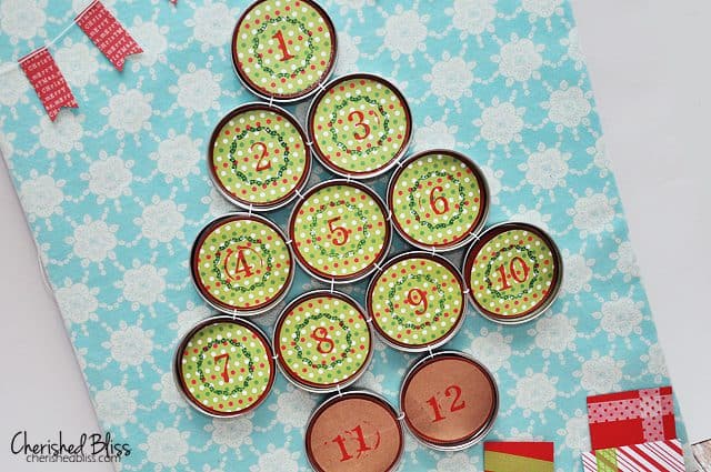 12 Days Of Christmas Advent Calendar using Mason Jar lids! // tutorial via cherishedbliss.com