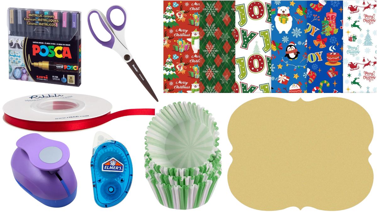 Assorted craft supplies for making cupcake liner ornaments, including patterned paper, ribbon, scissors, markers, glue tape, a circle punch, liners, and a blank ornament base.