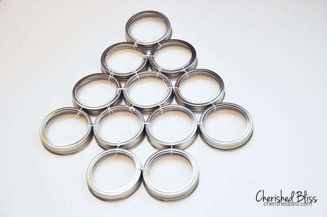 12 Days Of Christmas Advent Calendar using Mason Jar lids! // tutorial via cherishedbliss.com