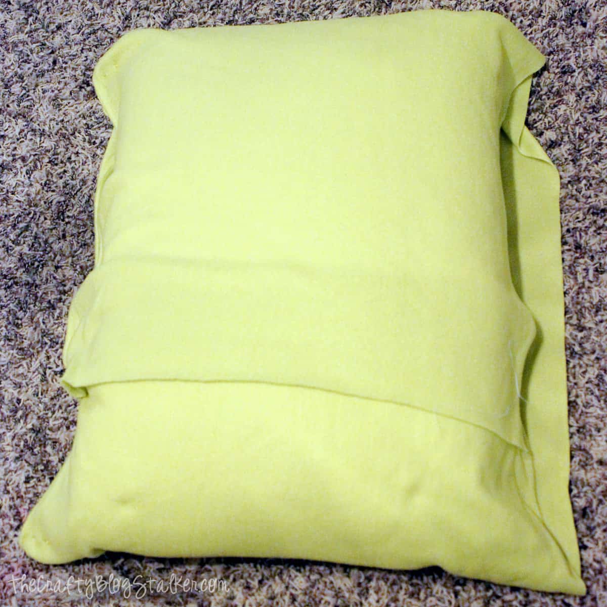 wrapping fleece fabric around a pillow 