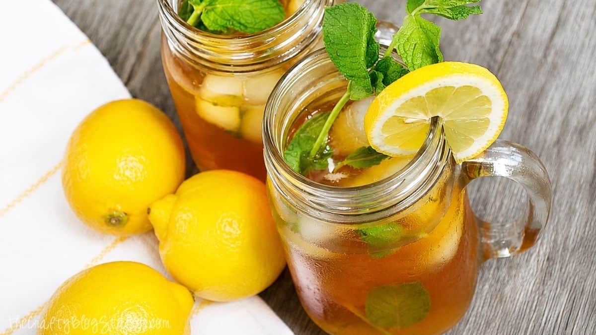 An easy Iced Tea Recipe with Lemonade Ice Cubes & Mint Leaves! Absolutely delicious! #AmericasTea #shop