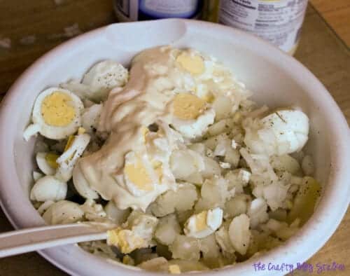 ingredients for potato salad in a large mixing bowl
