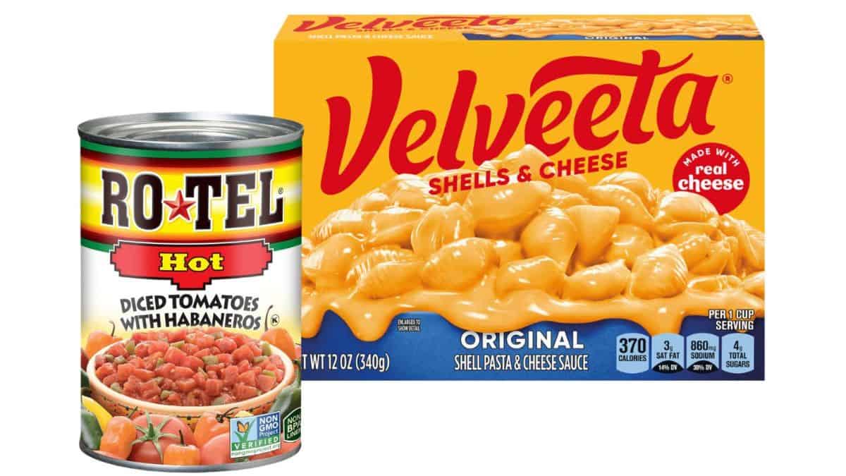 Can of Rotel diced tomatoes with habaneros next to a box of Velveeta shells and cheese on a white background.