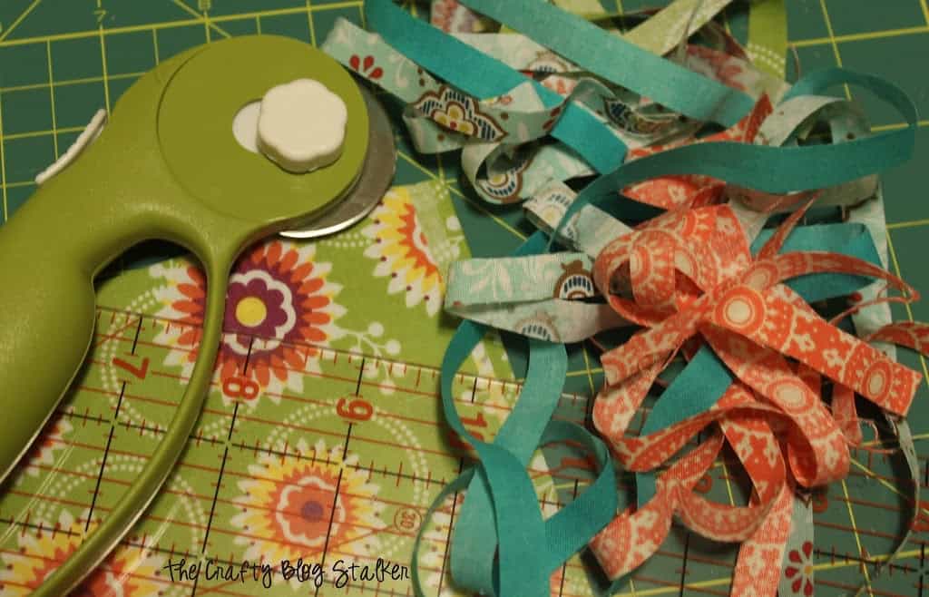 fabric strips and a rotary cutter. supplies used to make project