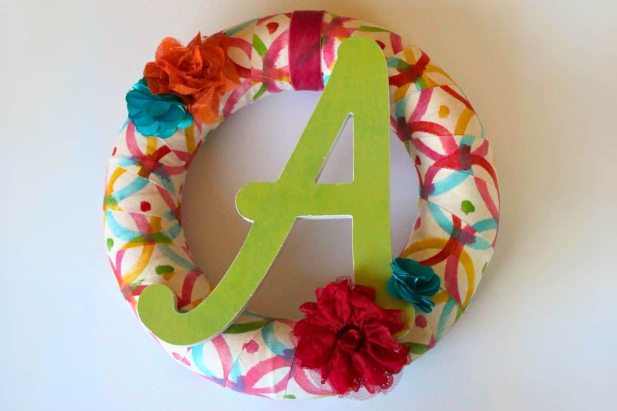 Fabric wrapped wreath with the monogram A.