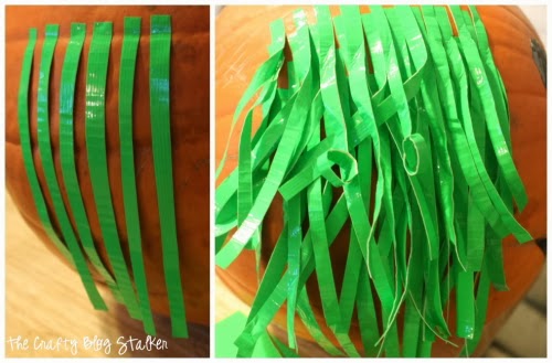green witch hair made out of strips of green duct tape