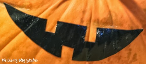 mouth made out of duct tape for a no-carve pumpkin