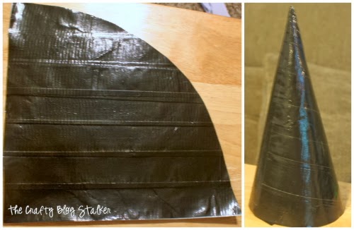 making a cone out of a sheet of black duct tape strips