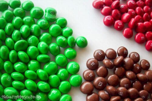sorted greed, red, and brown M&M's