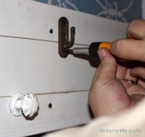 adding the last couple knobs into the coat rack
