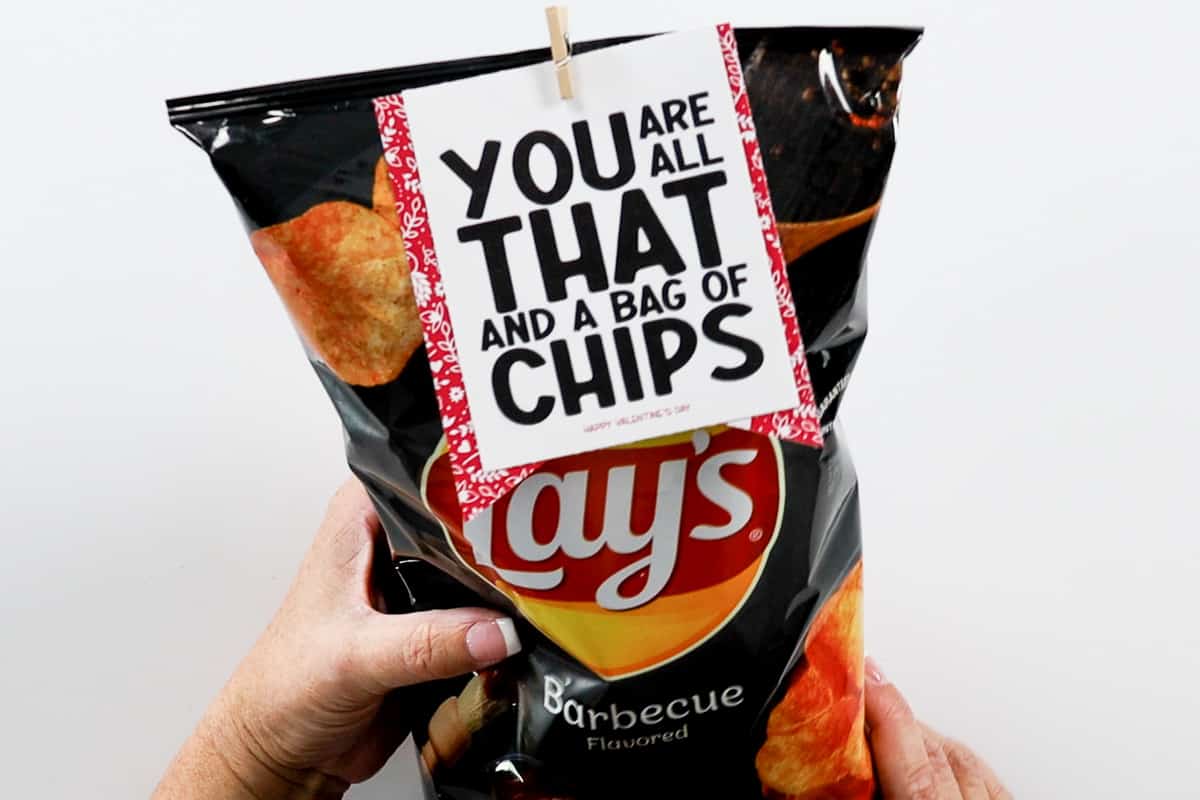 A bag of Lays BBQ chips with a printable tag attached to the front.