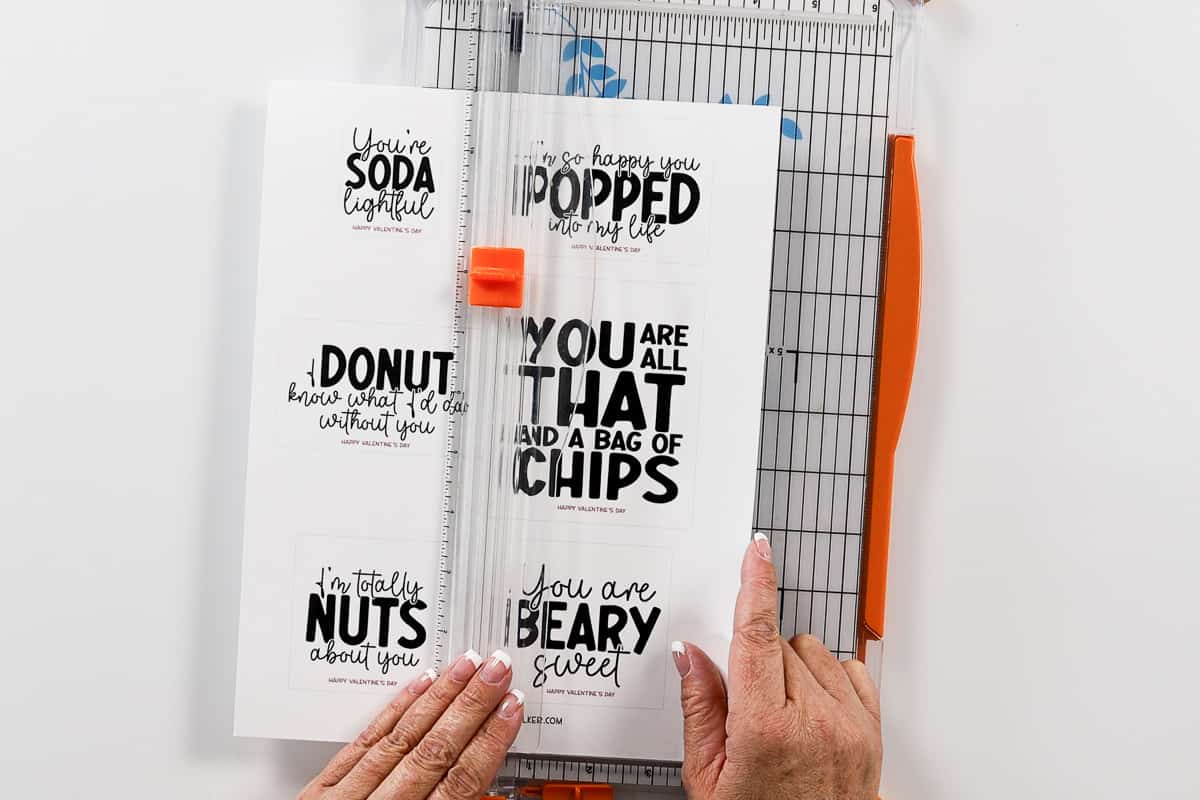 Cutting the printable sheet with a paper trimmer.