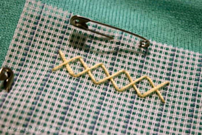Finishing the row of stitches.