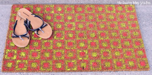 Pink and Yellow Stenciled Door Mat.