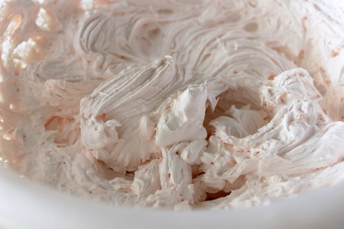 Cream topping made with Strawberry Cream Cheese and Whipped Topping.