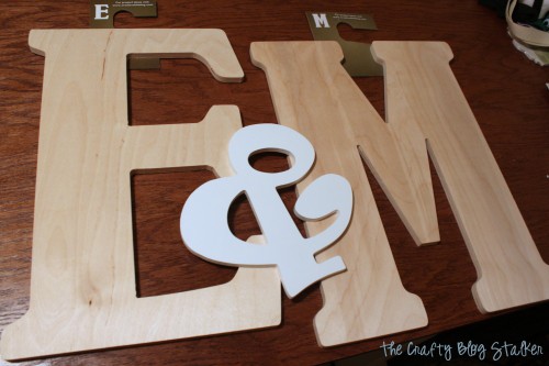 wood monogram letters E & M