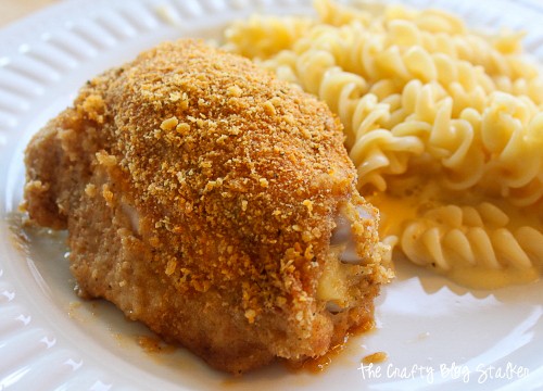 oven fried chicken thighs plated with mac and cheese