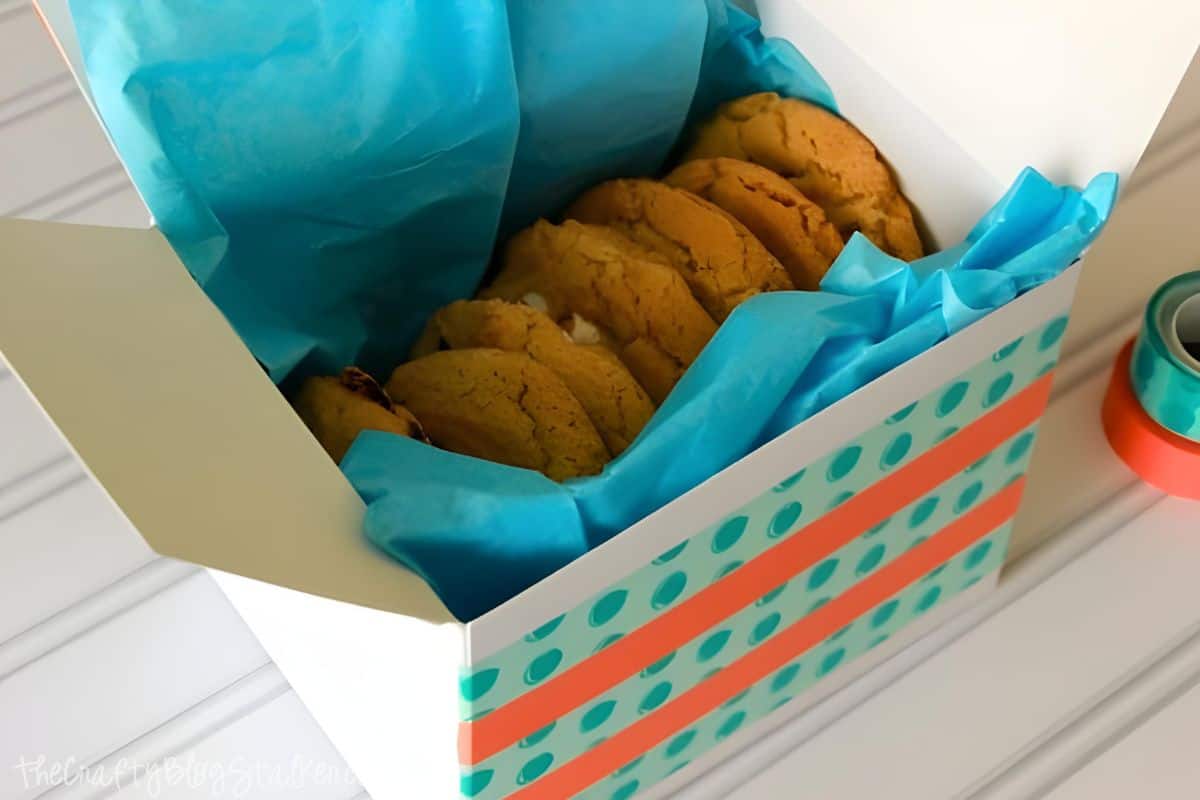 Cookie box with decorative washi tape to give as a teacher gift.