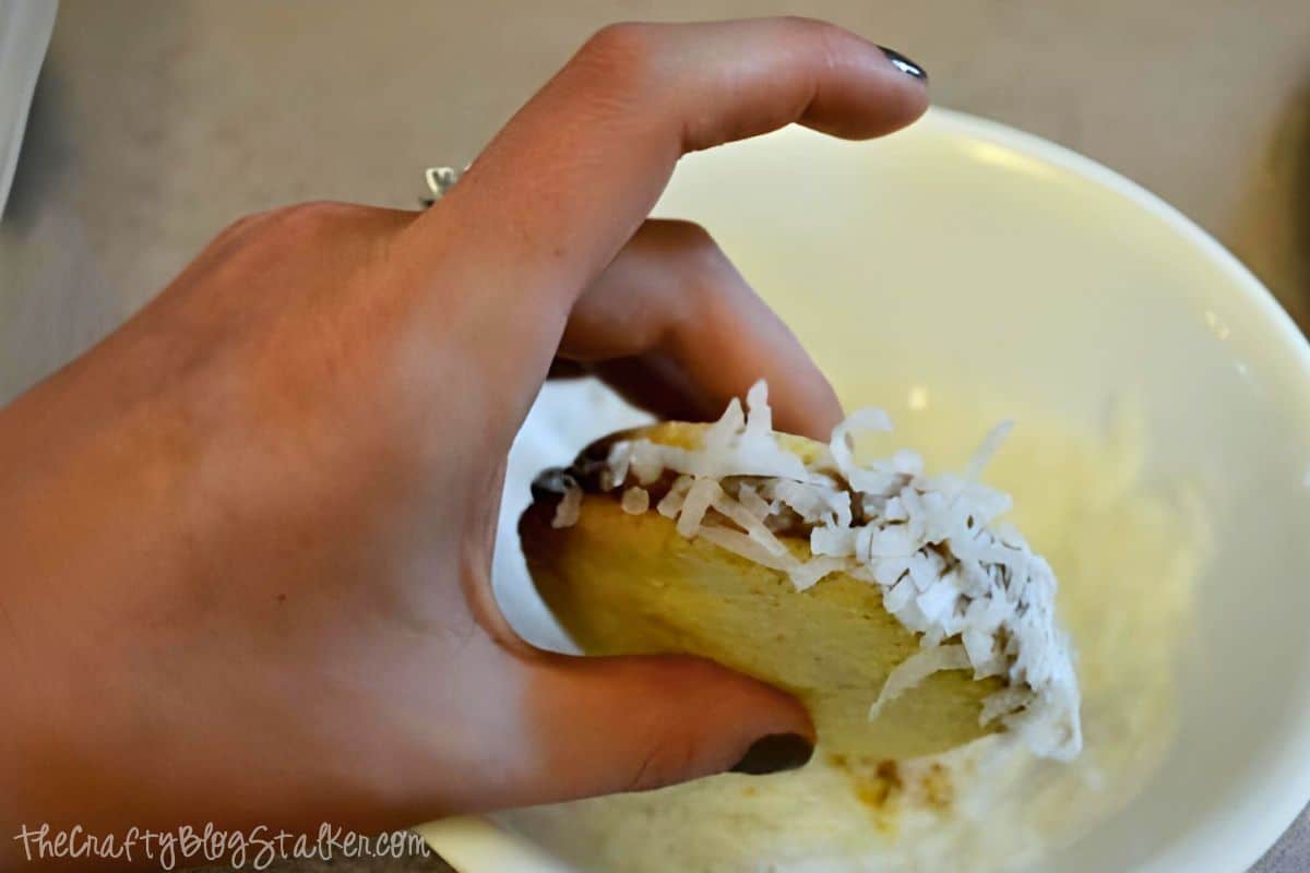 Cookie rolled in coconut flakes.