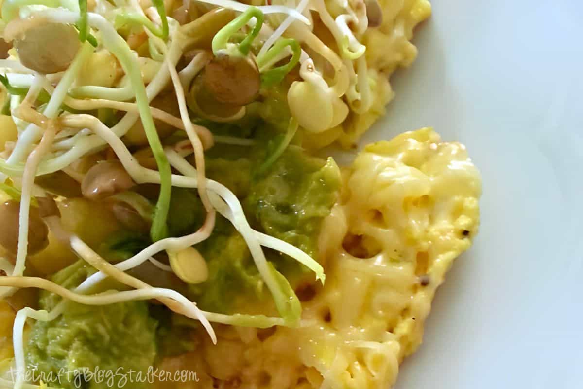 Fresh sprouts on scrambled eggs.