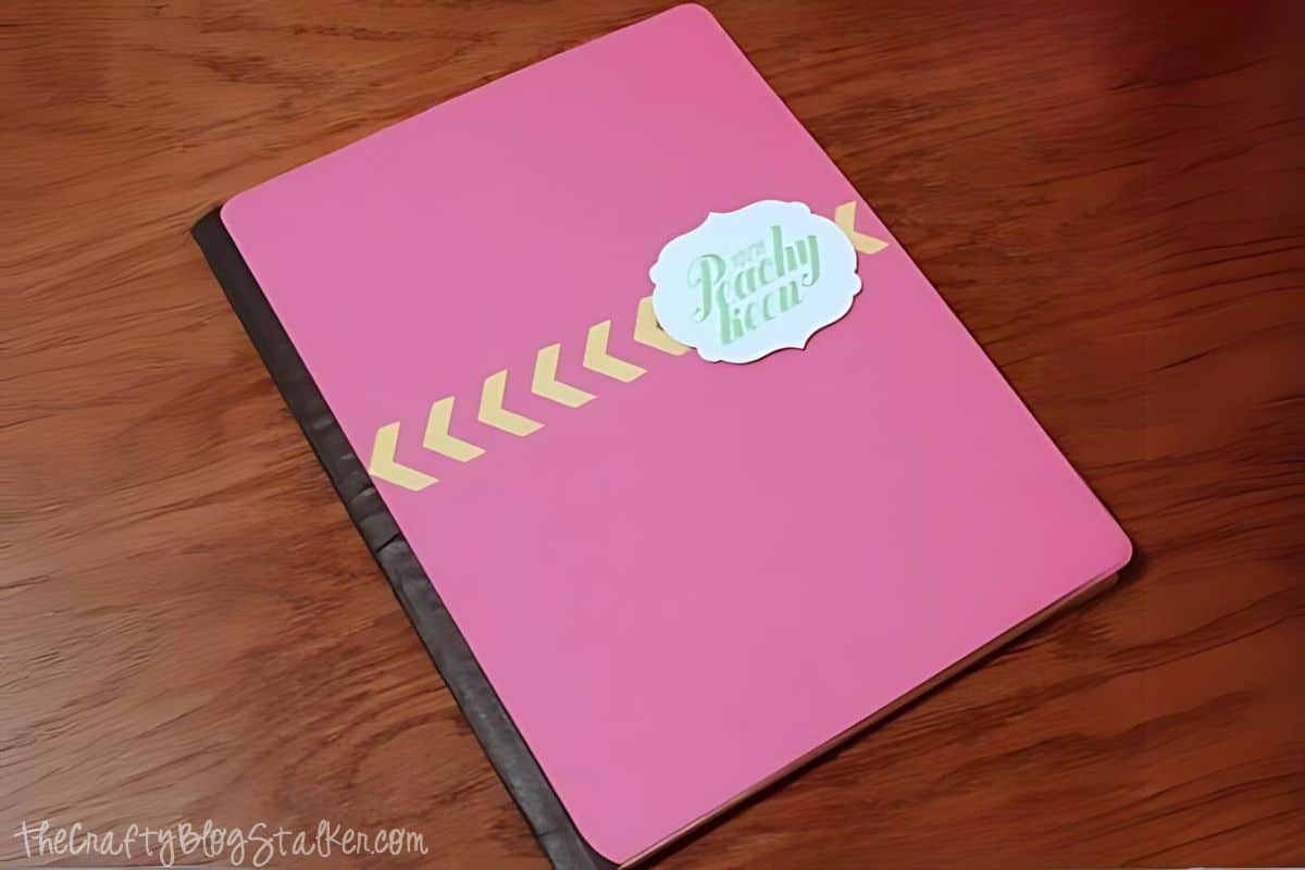 Cardstock covers glue to composition notebook.