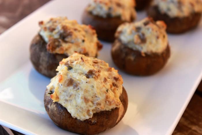 Sausage Stuffed Mushrooms on a white plate.