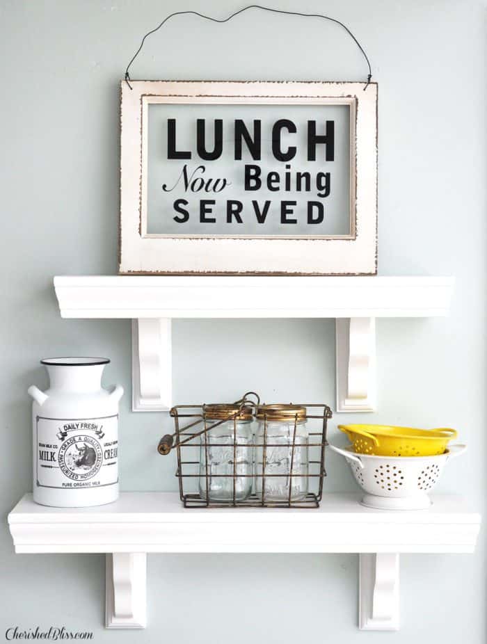 Build these easy Wooden Kitchen Shelves with just a few pieces of wood and trim. Get a quality product that costs less than store bought! 