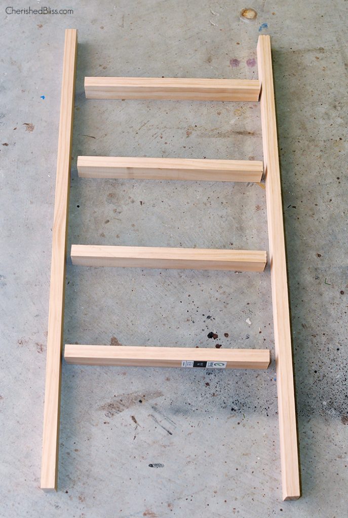 With this simple, quick, and easy DIY wooden Ladder Tutorial you can build your very own for under $5!! 
