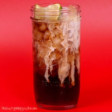 Dirty Diet Coke in a glass tumbler.