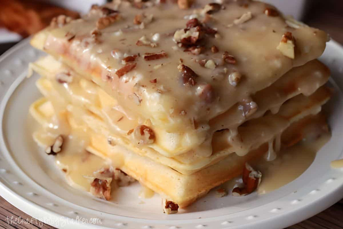 Waffles with Maple Cream Syrup and Chopped Pecans.
