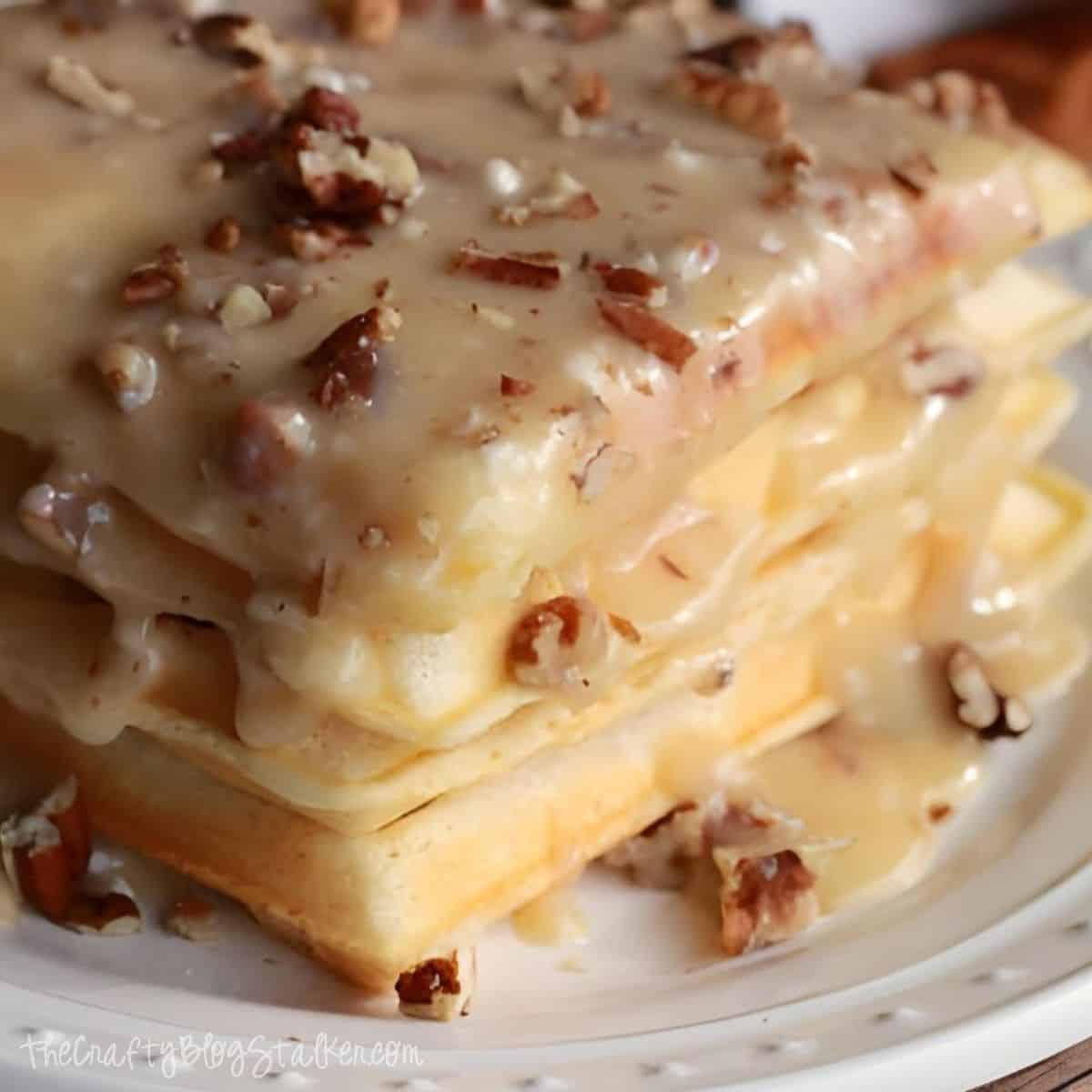 Waffles with maple nut buttercream sauce.