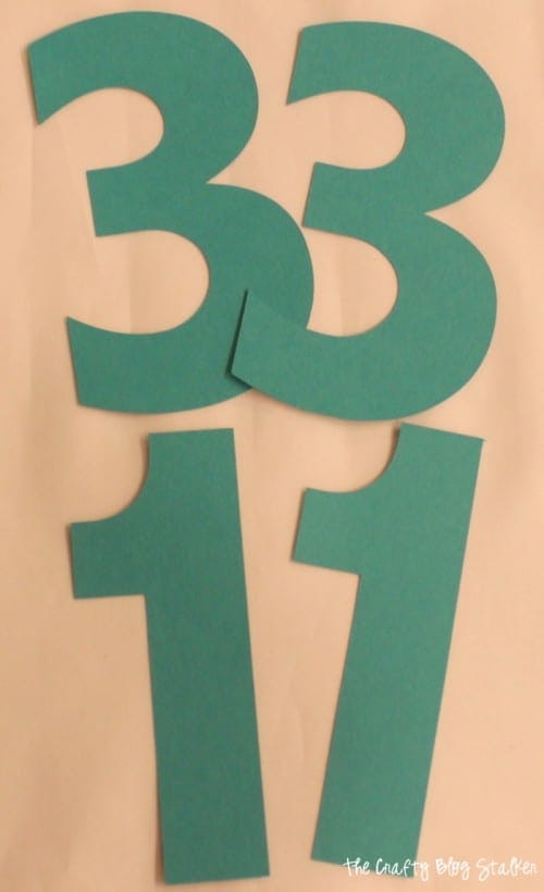 How to Make Glitter Cake Topper Numbers, a tutorial featured by top US craft blog, The Crafty Blog Stalker.
