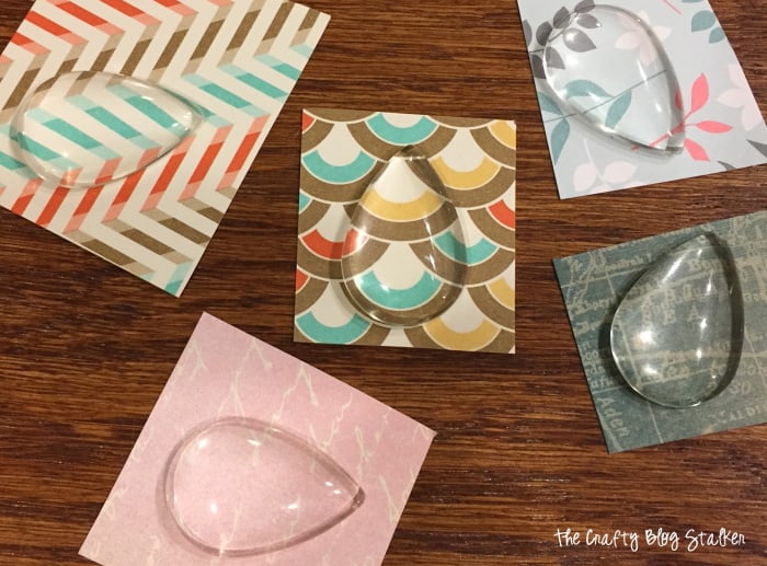 image of glass covers glued to patterned paper