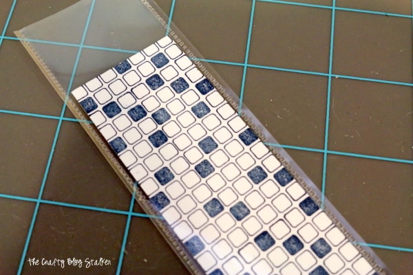 cardstock strip fused into a sheet protector